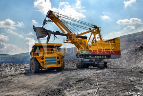 Picture of Loading of iron ore on very big dump-body truck